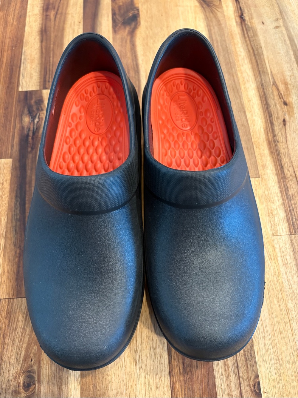 CROCS Women's Black Lite Ride slip resistant Clogs with Orange Footbed.. Size 9